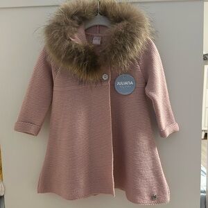 Hooded sweater with real fur trim